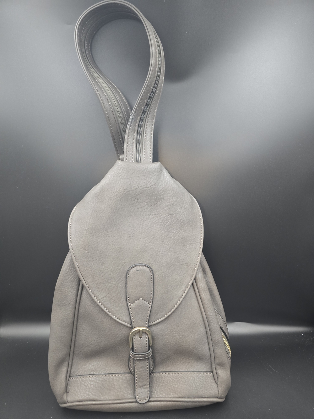 Modern Gray Leather Backpack with Buckle Strap